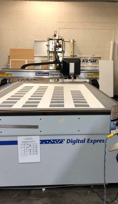 CNC router for cutting rigid substrates like acrylic, dibond, and wood