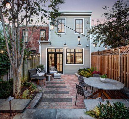 The rear addition to this Capitol Hill Row home leaves plenty of room for a stylish and functional patio.