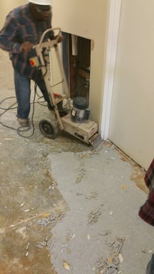 Removing VCT floor tiles 911 center