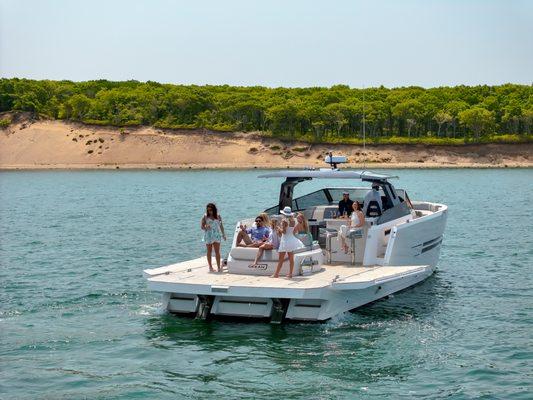 Our 57' Okean features a spacious deck that open to reveal even more space!