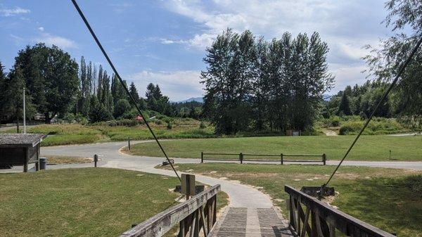 View of RV lot and drive up car camping sites from suspension bridge.