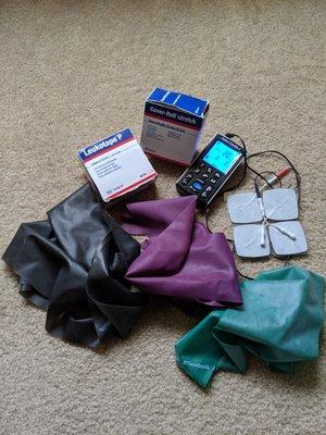 Neuro-muscular Electrical Stimulation, TENS, IF, Taping and LOTS of stretch bands!