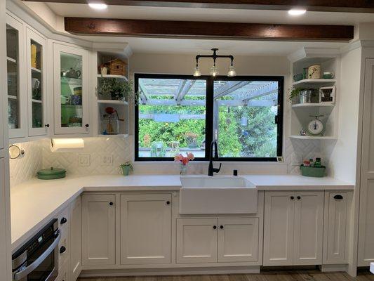 Farmhouse Kitchen with custom knotty alder cabinets.