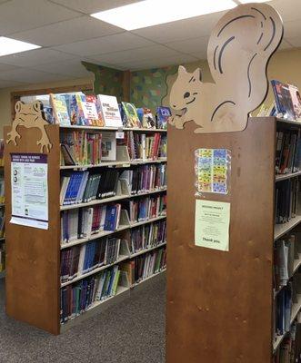 Whimsical decor in the children's literature room.