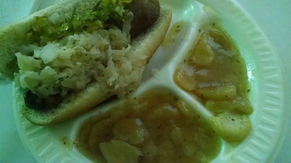 Brat with sauerkraut and German mustard, plus German potato salad.