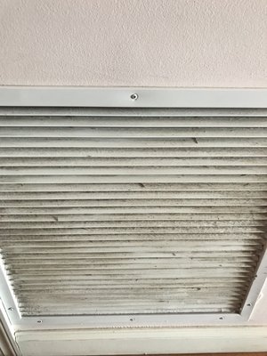 Air vents black with dirt and dust.