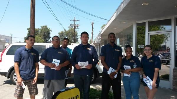 Some of our students doing outreach at the parade to encourage neighborhood youth to join.