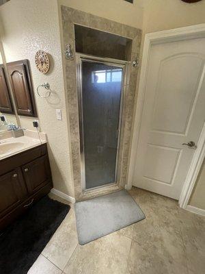 Before pic of shower door that had soap scum/calcium build-up that would not come off.