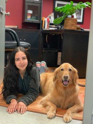 Maria, our customer service representative whom has been with us since 2017, poses with Morgan. Morgan is apart of our family.