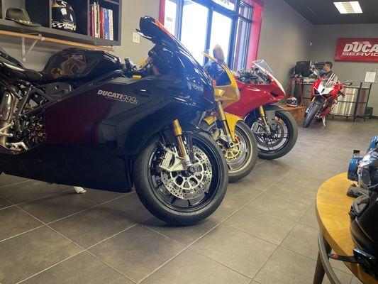 Waiting room.  Have some great modern classics and a couple of special new bikes to keep you company while you wait.