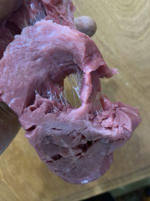 Meat with a glue like substance holding it together