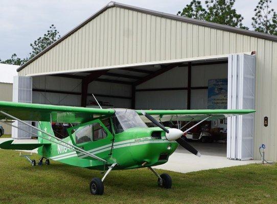 hangar door open for aircraft exit