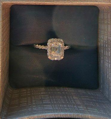 1 carat in the center and 1/2 carat tw for the rest. Absolutely stunning!