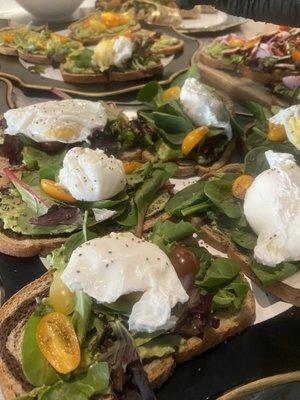 Avocado toast with poached eggs/ part of the brunch