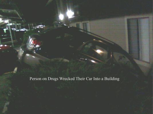 Person on Drugs Wrecked car into Building