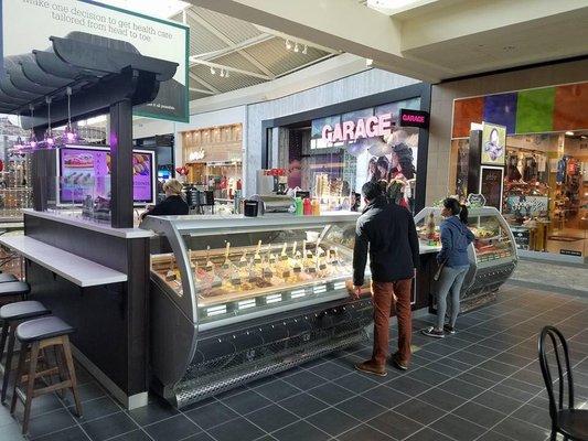 Ice cream shop in Mayfair Mall Milwaukee. The tops were fabricated and installed by Premier Countertops