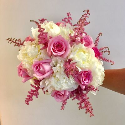 Pink roses and astilbe with white peonies