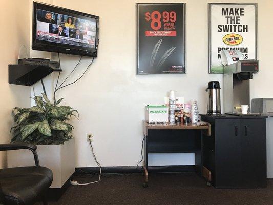 Coffee and a cute car battery-shaped charging station for virtually any device