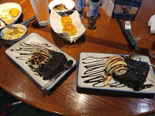 I got free chocolate cake by using the Red Lobster app.  It was so good!   Background is remains of a salmon meal.