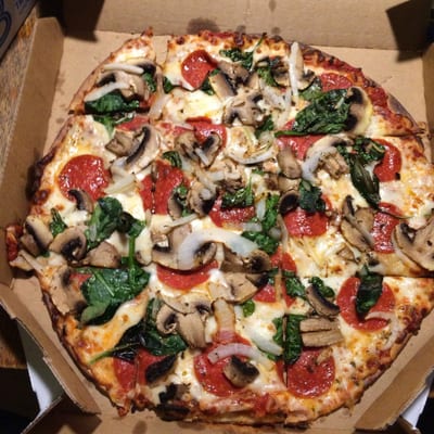 Onion, Pepperoni, mushrooms, and spinach on thin crust.