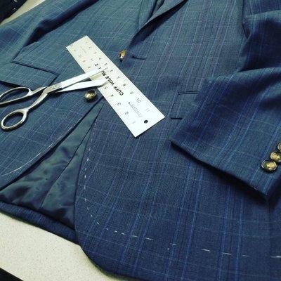 Shortening a suit jacket with every detail design