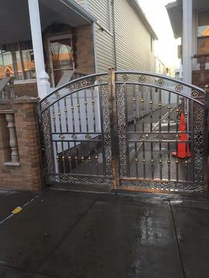 Stainless steel gate with gold design