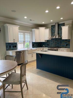 Kitchen remodel - painted all cabinetry, new stove hook, new backsplash