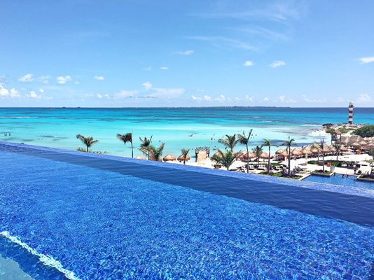 A beautiful Adult Only Rooftop Infinity Pool in the heart of Cancun.