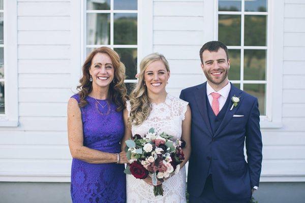 We tell your story! Queen Coordinator Carolyn with a bride and groom!