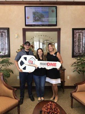 Happy clients at closing on their new League City home!