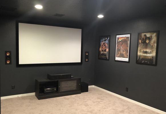 Dedicated theater room with 7.1.4 Dolby Atmos system.