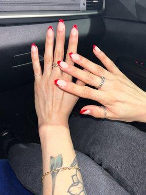 almond shaped dipped nails with red tip