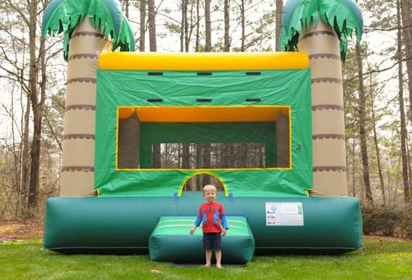 Our Tropical Bounce House measures 15'x15'x14'