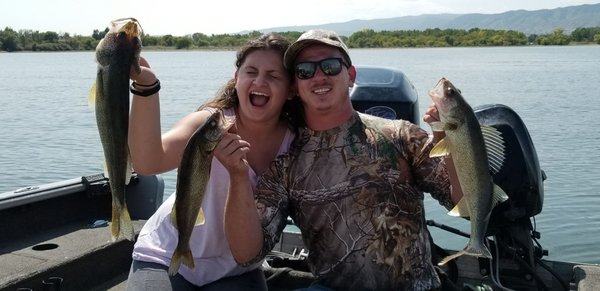 My wife and I after a great fiahing trip with will from tightline outdoors. . . She caught tje monster :)