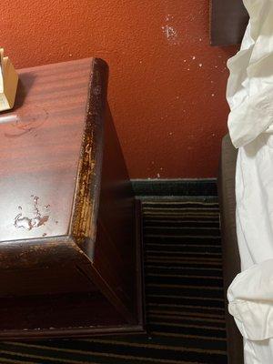 Old, worn nightstand.