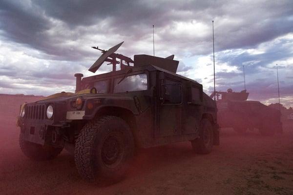 Humvees in red smoke, photographed for the Army National Guard. We photographed this just outside of the old Penitentiary of ...