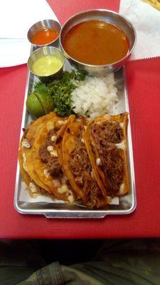 Birria Tacos at Paco's Tacos. The little sauces were not good, the consomme was very good, and the tacos excellent.