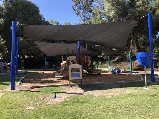 covered school playground to protect the kiddos from the heat and sun.