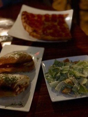 Chicken Parm sub, pizza, and chaser salad.