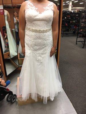 Beautiful wedding dress altered by Express tailor shop. Sides let out, shoulders shortened, hemmed and bustle.