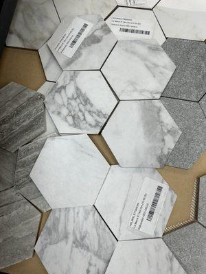 Looking at tile for new backsplash. A complete kitchen renovation is starting soon. I gota admit I love the honeycomb look.