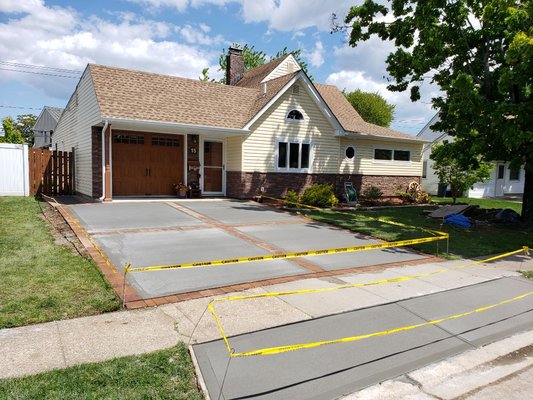 We used paver as the border with a four-box design and concrete in the middle.