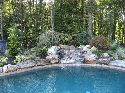 Gunite pool with a waterfall, design and construction