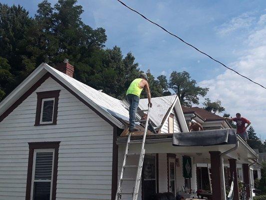 We are replacing a shingle with a new shingle roof on main part of house . We are installing a rubber roof on the front porch .