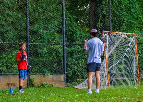 Working with middle schooler Ben Patterson! Getting some reps from behind the cage.