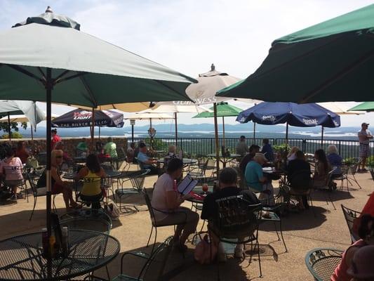 Outside seating with a beautiful view of the lake.