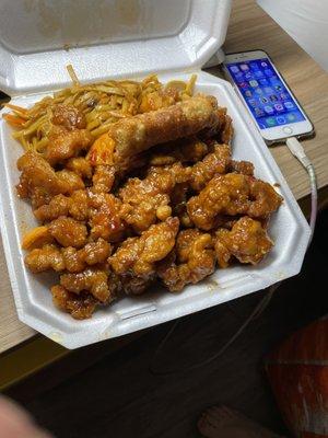 Orange chicken and Seafood Combination Lo Mein. Pretty good and big quantity.