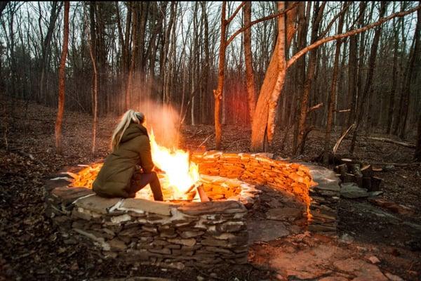 Private fire pit in the bank of The Farmhouse