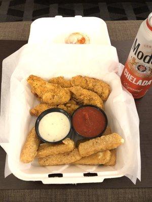 Chicken tenders and mozzarella sticks and my chelada lol