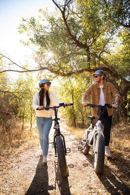 2 People walking with Pedego Elements